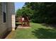 Backyard featuring a wooden deck with steps down to the backyard at 5517 Rock Shoals Way, Atlanta, GA 30349