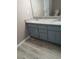 Bathroom vanity with double sinks and granite countertop at 5517 Rock Shoals Way, Atlanta, GA 30349