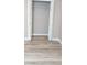 Open closet view from a bedroom shows laminate flooring and wire shelving at 5517 Rock Shoals Way, Atlanta, GA 30349