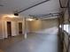 Spacious two-car garage with ample room for parking and storage, plus two finished bonus rooms at 5517 Rock Shoals Way, Atlanta, GA 30349