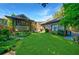 The expansive backyard features lush green grass and manicured landscaping, perfect for outdoor enjoyment at 1146 Cumberland Ne Rd, Atlanta, GA 30306