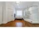 Modern bathroom featuring a glass-enclosed shower and a sleek, freestanding tub at 1146 Cumberland Ne Rd, Atlanta, GA 30306