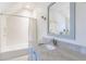 Bathroom with tub and shower combination, vanity with undermount sink and marble top at 1146 Cumberland Ne Rd, Atlanta, GA 30306