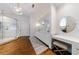Bright bathroom with double vanity, stylish lighting, walk-in shower, and a makeup vanity at 1146 Cumberland Ne Rd, Atlanta, GA 30306