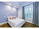 Serene bedroom with a soft color palette and abundant natural light creating a peaceful retreat at 1146 Cumberland Ne Rd, Atlanta, GA 30306