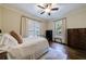 Comfortable bedroom with hardwood floors, natural light, and neutral decor at 1146 Cumberland Ne Rd, Atlanta, GA 30306