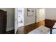 Bedroom with ensuite bathroom and hardwood floors at 1146 Cumberland Ne Rd, Atlanta, GA 30306