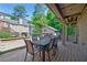Inviting outdoor dining space on a wood deck, perfect for entertaining at 1146 Cumberland Ne Rd, Atlanta, GA 30306