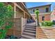 Inviting deck with wood railing and steps leads to a shaded outdoor dining area at 1146 Cumberland Ne Rd, Atlanta, GA 30306