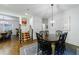 The dining area is adjacent to the staircase and provides access to other rooms at 1146 Cumberland Ne Rd, Atlanta, GA 30306