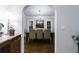 Elegant dining room with hardwood floors, chandelier, and view to outside at 1146 Cumberland Ne Rd, Atlanta, GA 30306