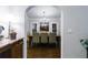 Elegant dining room with a chandelier, large windows, and stylish decor at 1146 Cumberland Ne Rd, Atlanta, GA 30306
