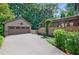 Exterior view of home showcasing the garage, driveway, and the home's architecture at 1146 Cumberland Ne Rd, Atlanta, GA 30306
