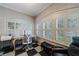 Bright home office with checkerboard floors, textured walls, and large windows with plantation shutters at 1146 Cumberland Ne Rd, Atlanta, GA 30306