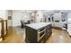 Spacious kitchen with large island, modern appliances, and hardwood floors at 1146 Cumberland Ne Rd, Atlanta, GA 30306