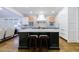 Contemporary kitchen featuring a central island, white cabinetry, and an open layout at 1146 Cumberland Ne Rd, Atlanta, GA 30306