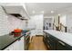 Bright kitchen with white cabinets, stainless steel appliances, and a center island with marble countertop at 1146 Cumberland Ne Rd, Atlanta, GA 30306