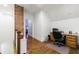 Well-lit office featuring a classic wooden desk and exposed brick accent wall on the upper level at 1146 Cumberland Ne Rd, Atlanta, GA 30306