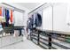 Well-organized walk-in closet featuring shelving and drawers for optimal storage solutions at 1146 Cumberland Ne Rd, Atlanta, GA 30306