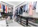 Walk-in closet featuring adjustable shelving, drawers, and ample storage for clothing and accessories at 1146 Cumberland Ne Rd, Atlanta, GA 30306