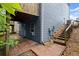 Backyard exterior featuring a patio, stairs, and lush greenery at 212 Ranier Court, Canton, GA 30114
