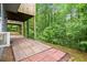A brick back patio in a wooded setting at 212 Ranier Court, Canton, GA 30114