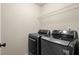 Laundry room featuring modern, front-load washer and dryer at 212 Ranier Court, Canton, GA 30114