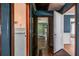 Hallway boasts a full bathroom and doors leading to bedrooms and living spaces at 3020 Washington Rd, East Point, GA 30344