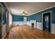 Bright living room with hardwood flooring, fireplace, and views to other rooms at 3020 Washington Rd, East Point, GA 30344