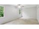 A blank bedroom with two windows at 3262 Mitsy Forest Way, Marietta, GA 30068