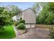 Well-maintained two-story home with a two-car garage and manicured landscaping at 3262 Mitsy Forest Way, Marietta, GA 30068