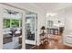Sunroom view to kitchen with breakfast bar at 3262 Mitsy Forest Way, Marietta, GA 30068