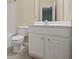 Bathroom featuring a toilet, sink, and shower at 5159 Wellsley Bnd, Alpharetta, GA 30005