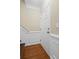 Entryway with hardwood floors, white trim, and a white door at 5159 Wellsley Bnd, Alpharetta, GA 30005