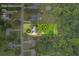 Aerial view of property showcasing the home, lot lines, and surrounding neighborhood at 7920 Silversmith Dr, Cumming, GA 30028
