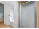 Bathroom featuring tub-shower combo and glass enclosed shower at 7920 Silversmith Dr, Cumming, GA 30028