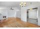 Spacious living room featuring hardwood floors and a fireplace at 7920 Silversmith Dr, Cumming, GA 30028