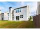 A shot of the exterior of a home featuring a beautiful lawn at 8750 Radford Ln, Suwanee, GA 30024
