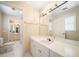 Bathroom featuring double doors, toilet, sink and vanity at 125 Savannah Estates Dr, Atlanta, GA 30350