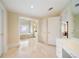 Spacious bathroom features a marble floor and multiple rooms leading to other rooms at 125 Savannah Estates Dr, Atlanta, GA 30350