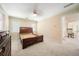 Bedroom with a wooden dresser, bed frame, and entry to the hallway at 125 Savannah Estates Dr, Atlanta, GA 30350