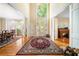 Spacious foyer with hardwood floors, grand front door, and large windows at 125 Savannah Estates Dr, Atlanta, GA 30350