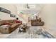 Bright living room with staircase, comfortable seating, and natural light at 125 Savannah Estates Dr, Atlanta, GA 30350