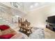 Bright living room showcasing a staircase and open layout at 125 Savannah Estates Dr, Atlanta, GA 30350
