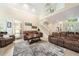 Comfortable living room with an open floor plan and staircase at 125 Savannah Estates Dr, Atlanta, GA 30350