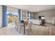 Open concept dining and living room with sliding glass doors and stylish decor at 237 Paisley Way, Locust Grove, GA 30248