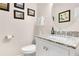 Well-appointed bathroom with granite countertop, modern fixtures, and a clean, minimalist design at 247 Creek View Ln, Acworth, GA 30102