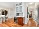 Open kitchen area featuring a wine cooler, ample cabinet space, and access to the dining room at 247 Creek View Ln, Acworth, GA 30102
