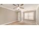 Neutral bedroom with carpet, ceiling fan, and window providing natural light at 2551 Village Creek Se Lndg, Atlanta, GA 30316
