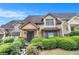 Charming townhome exterior with well-maintained landscaping and inviting entrance at 2551 Village Creek Se Lndg, Atlanta, GA 30316